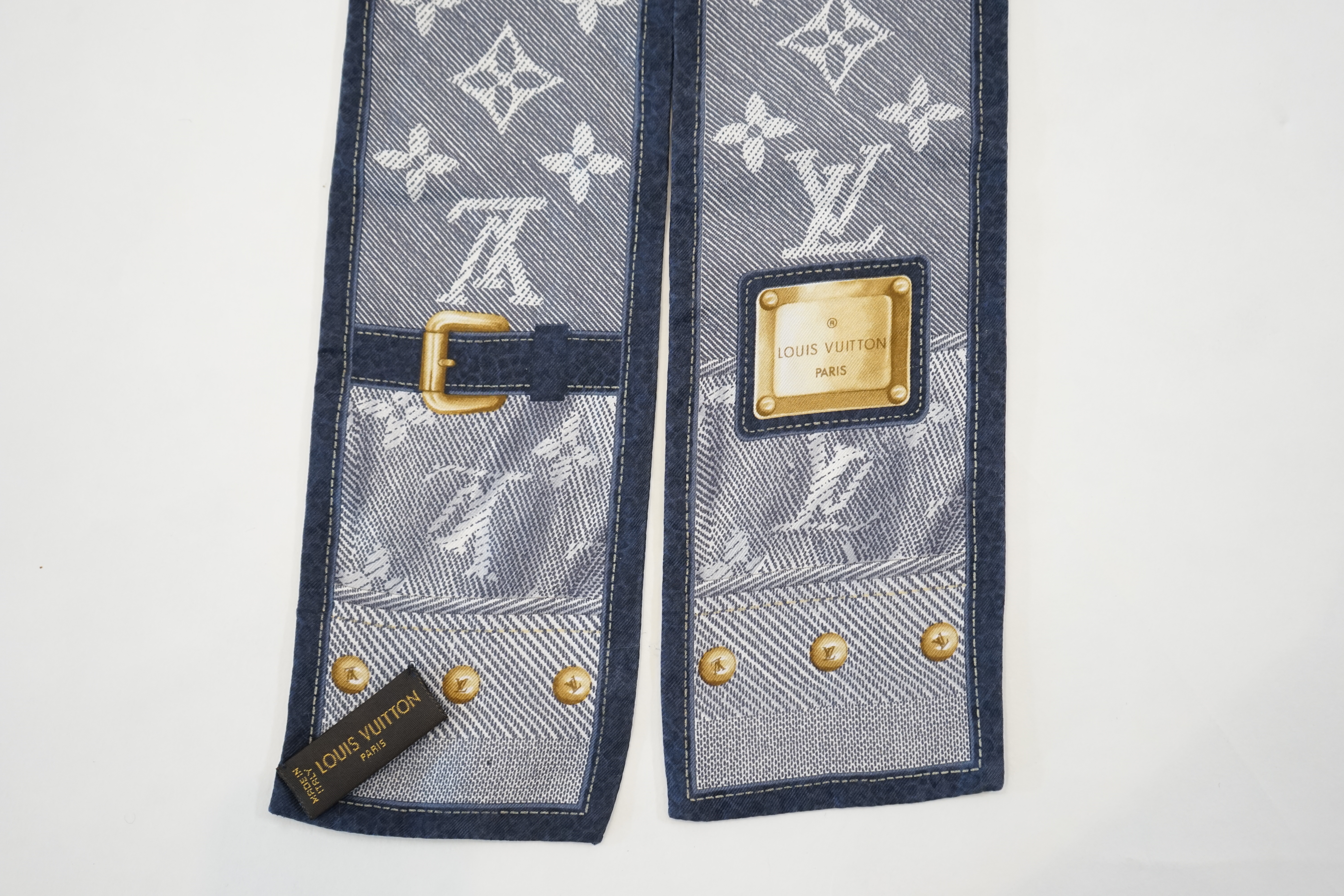 A Louis Vuitton Paris Monogram Ebene silk denim bandeau scarf, 114cm x 8cm